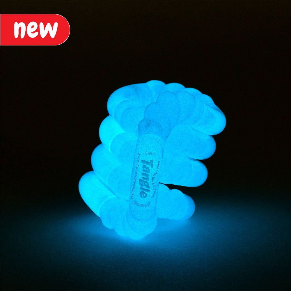 Sensory Twisty tactile fight toy tangle glow in the dark, glowing bright blue on a black background supplied and distributed in the uk by eduk8 worldwide